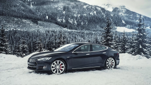 Black Tesla in snow - Electric Cars