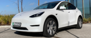 Front of white Tesla Model Y at an angle