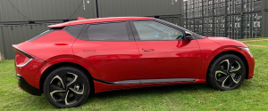 Red Kia EV6 on grass