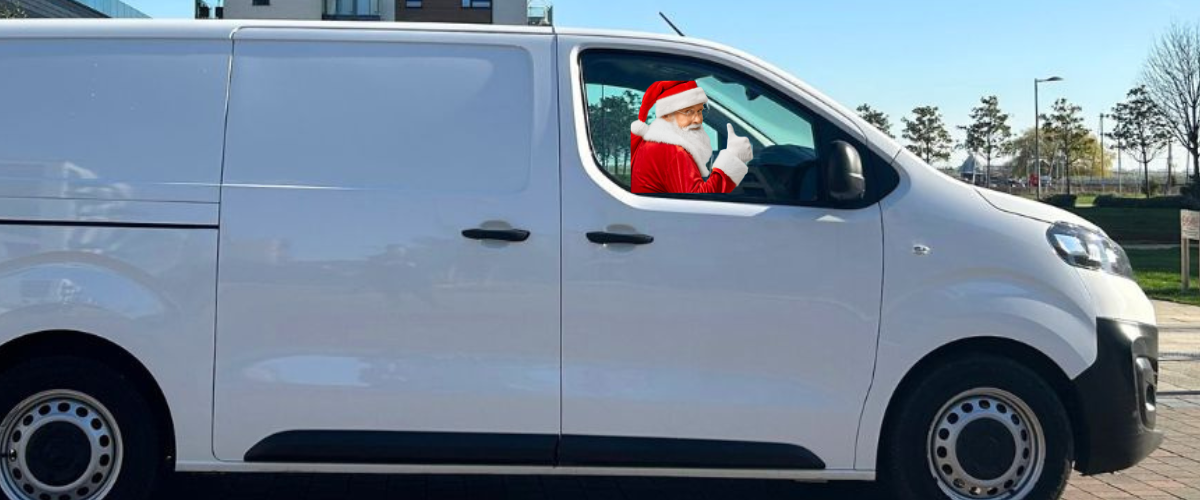 Santa driving a van