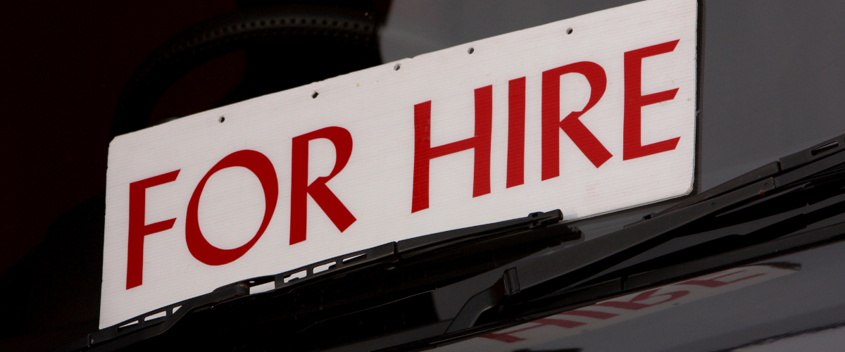 for hire sign on a car